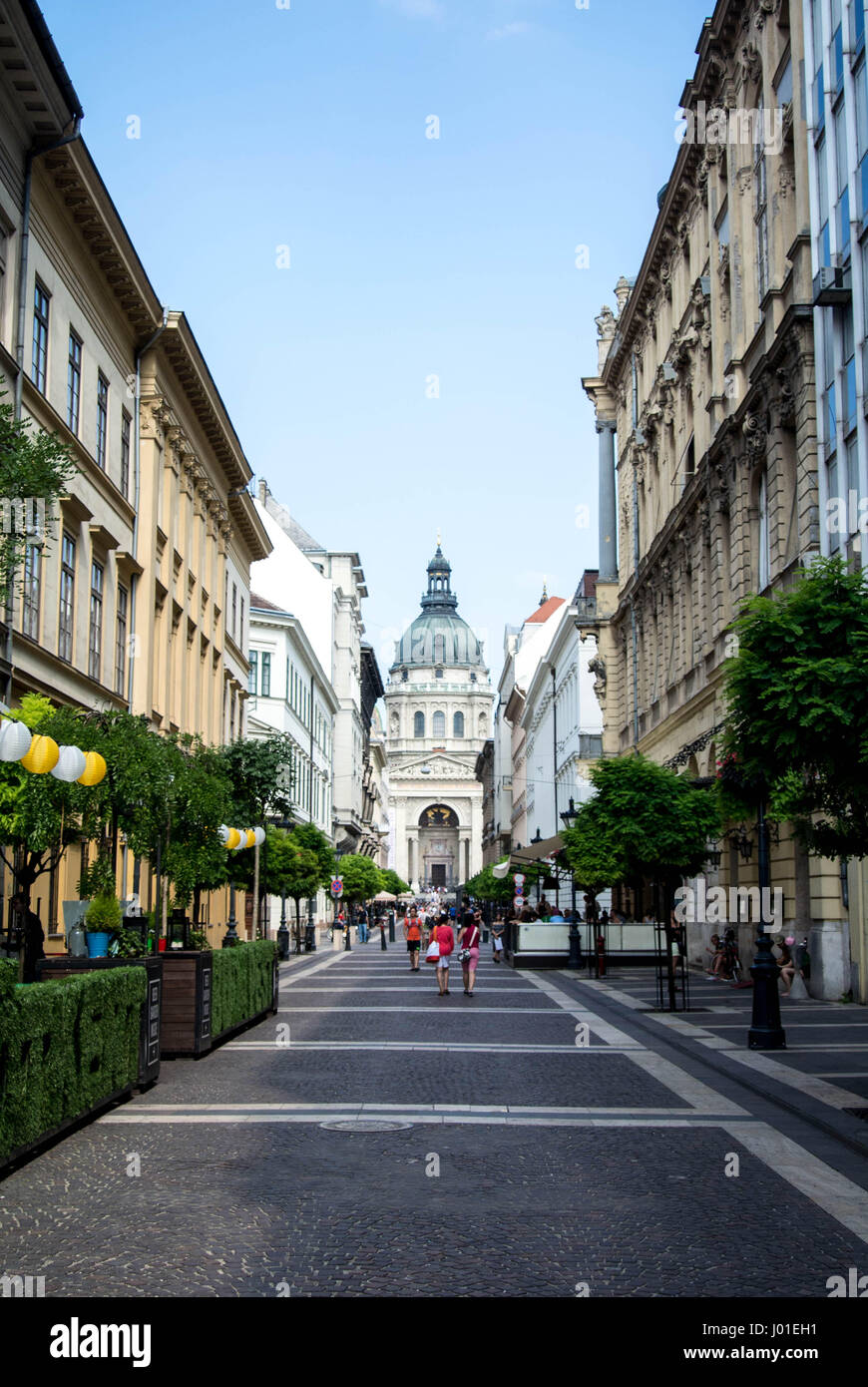 BUDAPEST, HUNGARY - JULY 24, 2016: A street of Budapest and St. Stephen's (Szent Istvan) Basilica, Hungary. Stock Photo