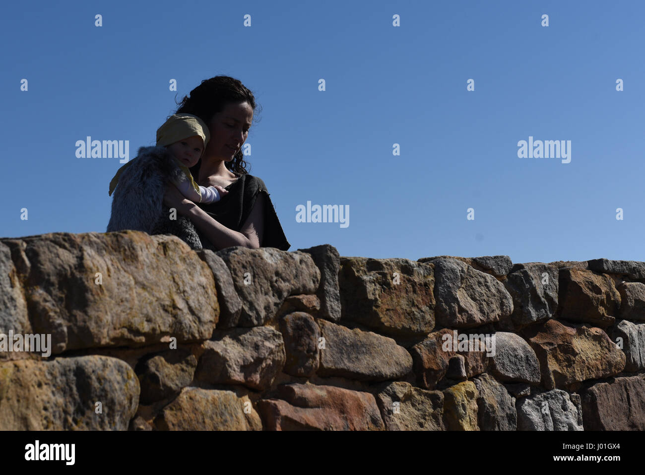 Garray, Spain. 08th Apr, 2017. A woman and her daughter wearing a costume of ancient times during a representation in the ancient Celtiberian settlement of Numantia, famous for its role in the Celtiberian War, in Soria, north of Spain. Credit: Jorge Sanz/Pacific Press/Alamy Live News Stock Photo