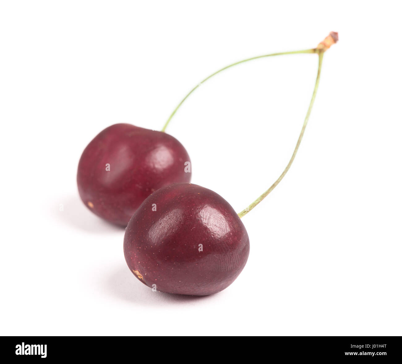 Ripe cherry isolated on white background Stock Photo - Alamy
