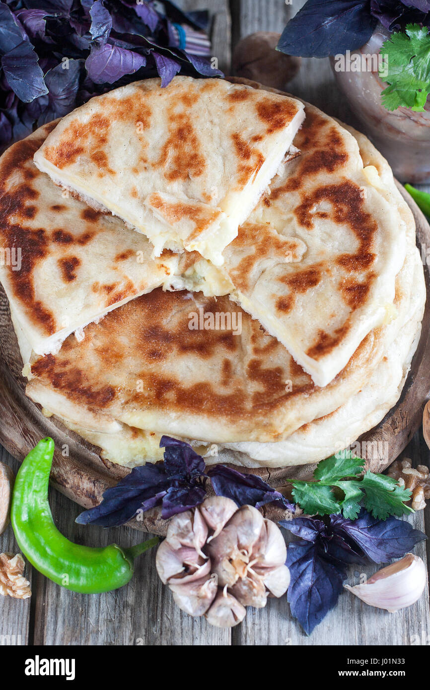 Traditional khachapuri flatbread stuffed with cheese Stock