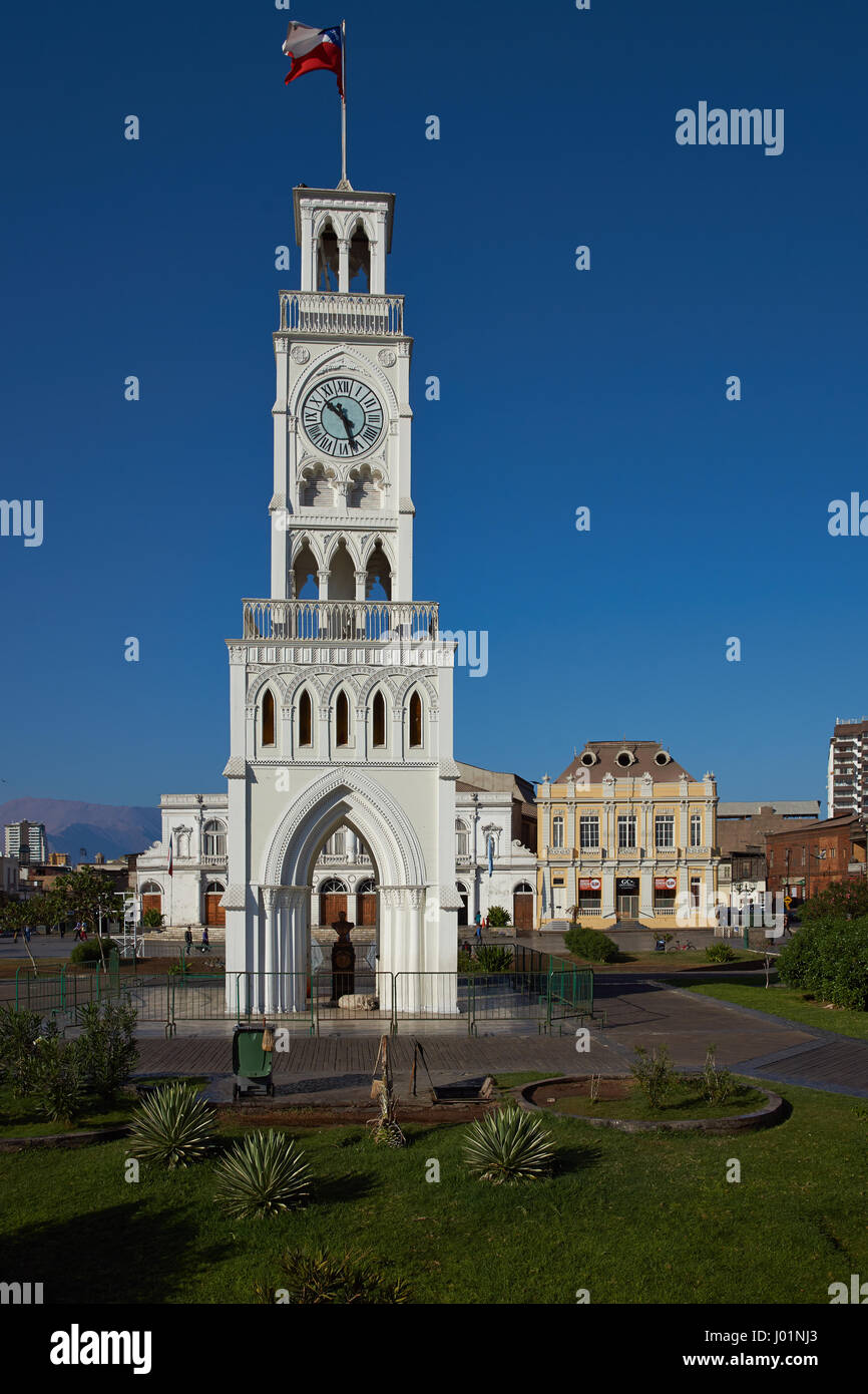 Historic clock tower in Plaza Arturo Prat in the old quarter of Iquique on the Pacific coast of northern Chile. Built circa 1877. Stock Photo