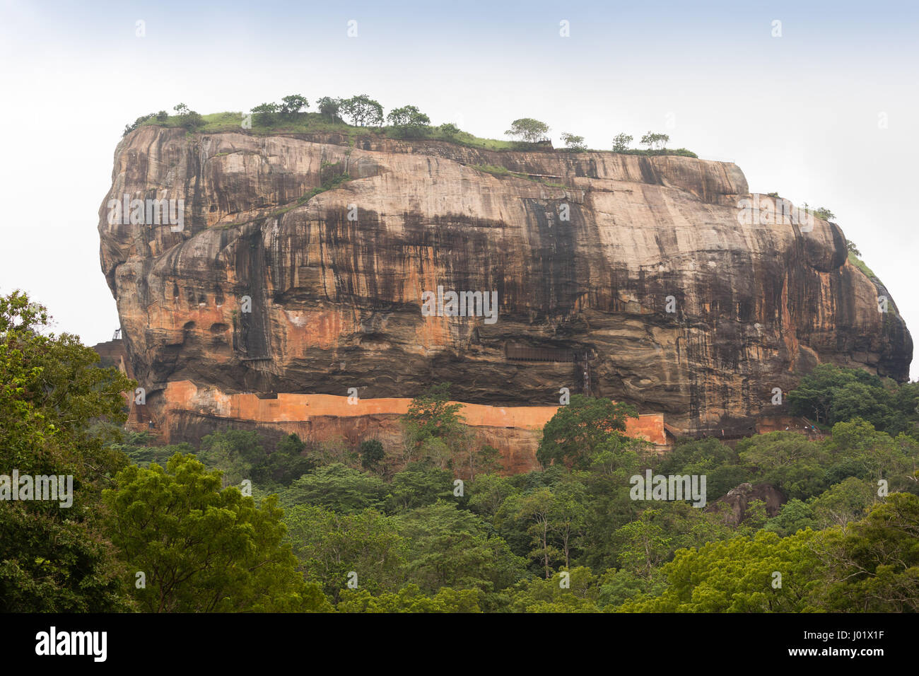 Sigiriya is a large stone and ancient rock fortress and palace ruin in the central Matale District of Sri Lanka Stock Photo