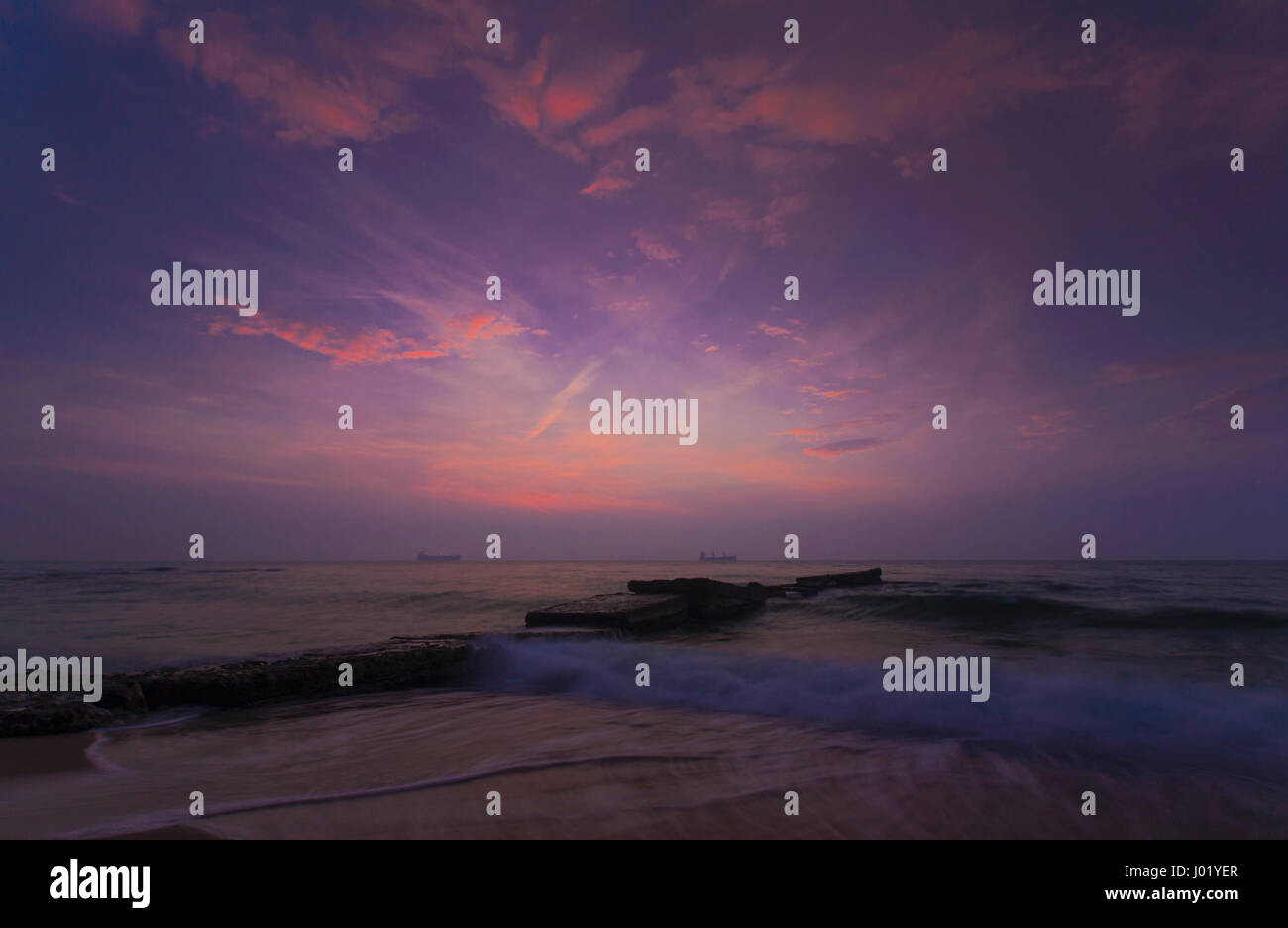 Beautiful sunrise over the sea with dramatic clouds on the sky Stock ...