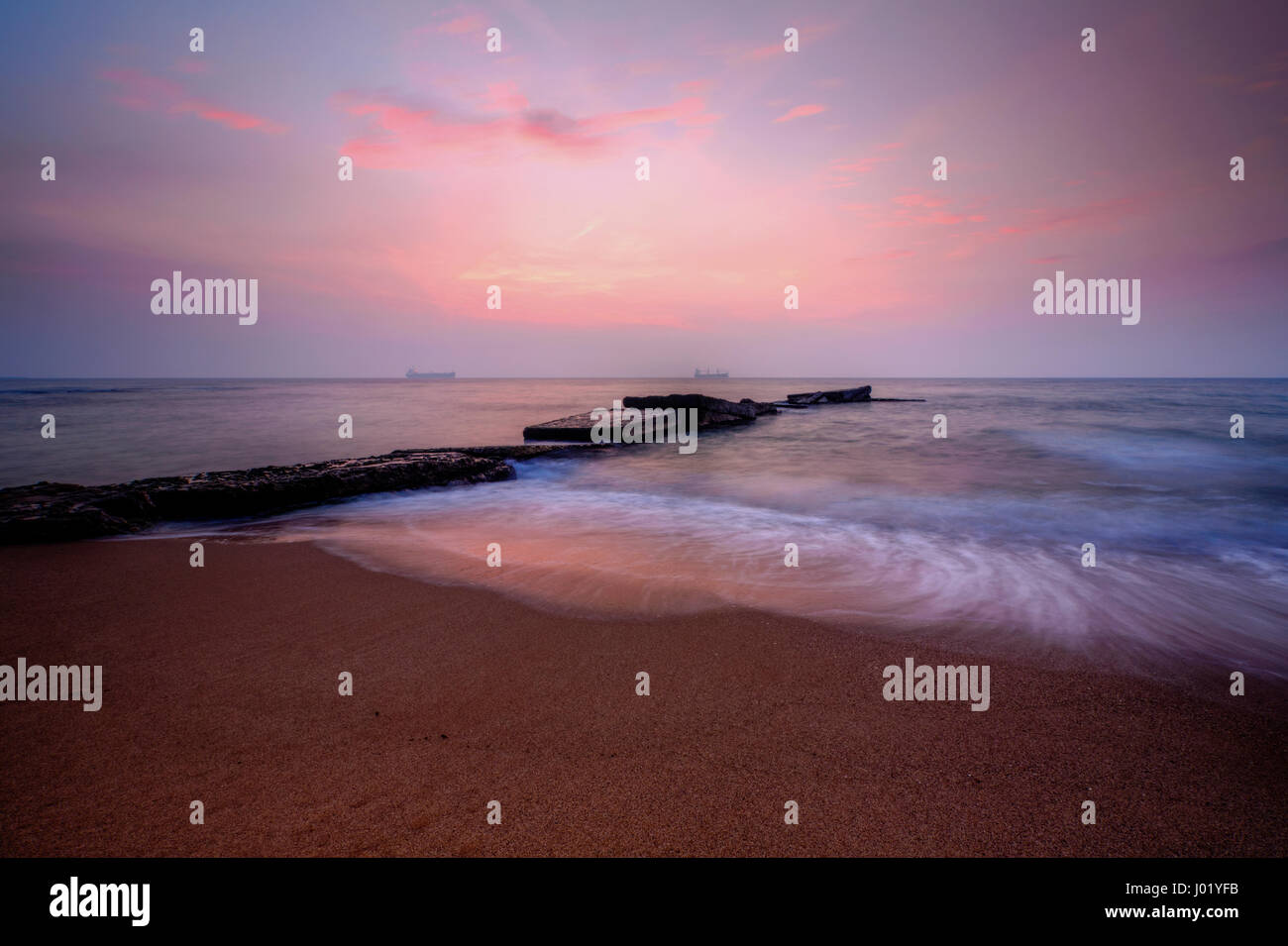 Beautiful sunrise over the sea with dramatic clouds on the sky Stock ...