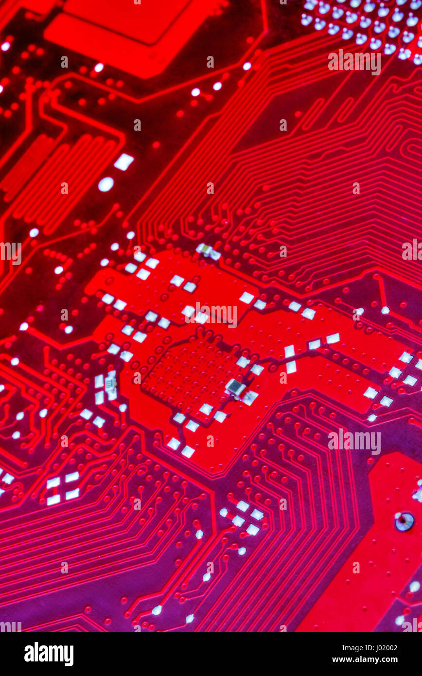 Technological background with red computer motherboard closeup Stock ...