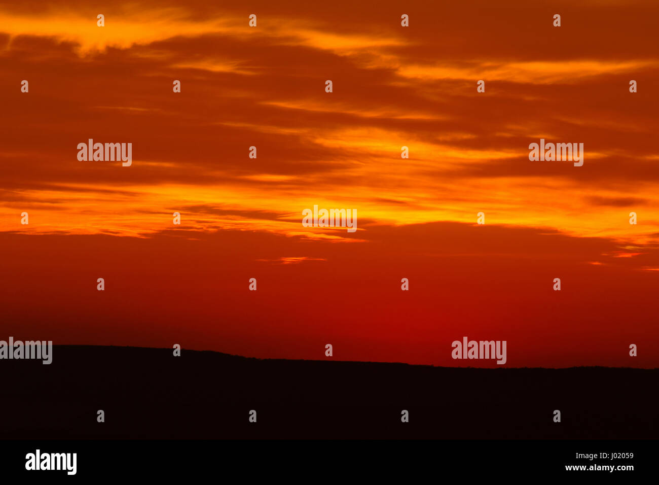 Beautiful sunset with dramatic clouds on the sky Stock Photo - Alamy