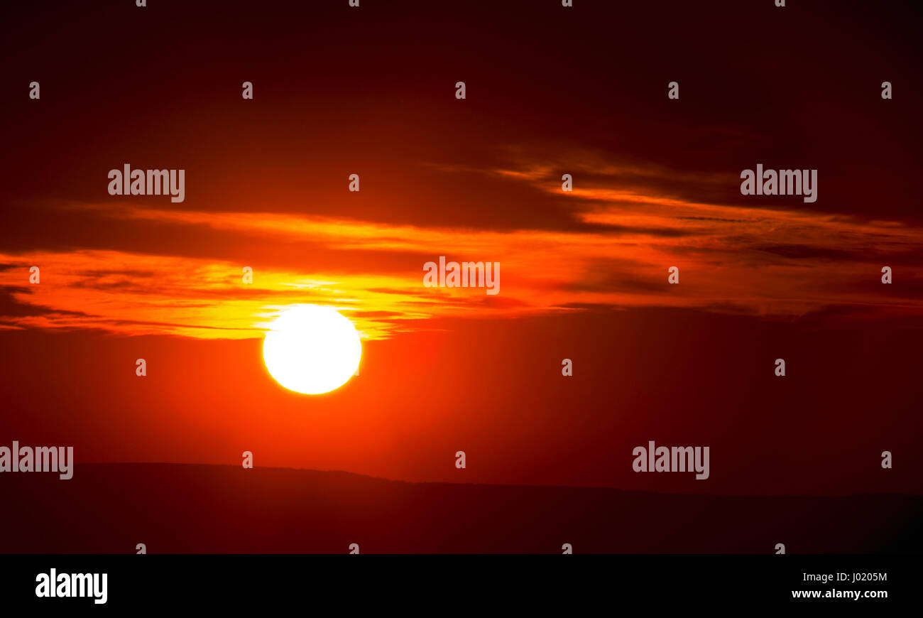 Beautiful sunset with dramatic clouds on the sky Stock Photo - Alamy