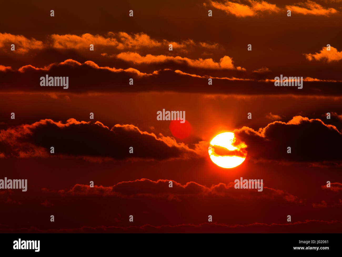 Beautiful sunset with dramatic clouds on the sky Stock Photo - Alamy