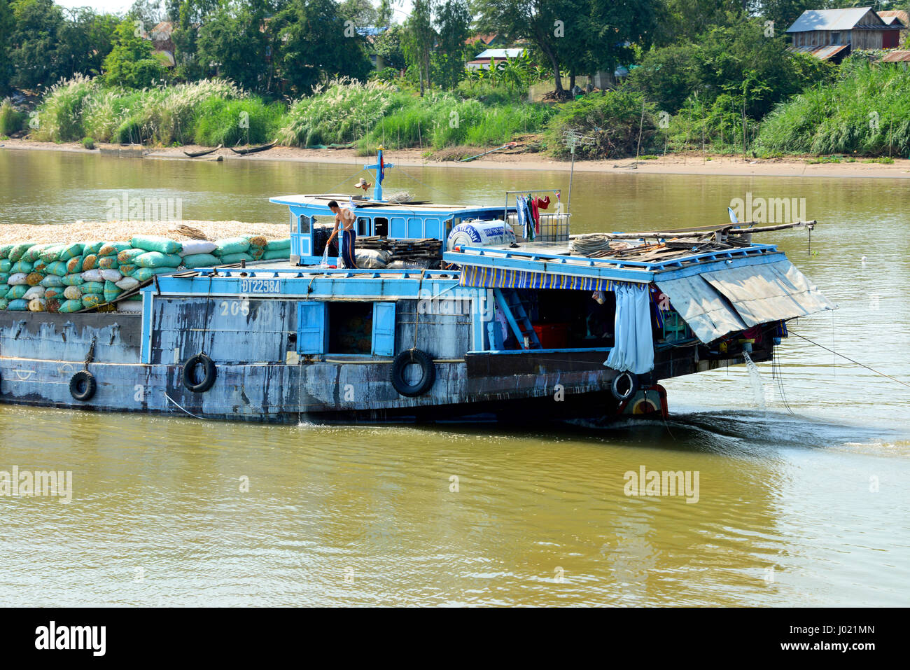 Laden boats carrying goods up and