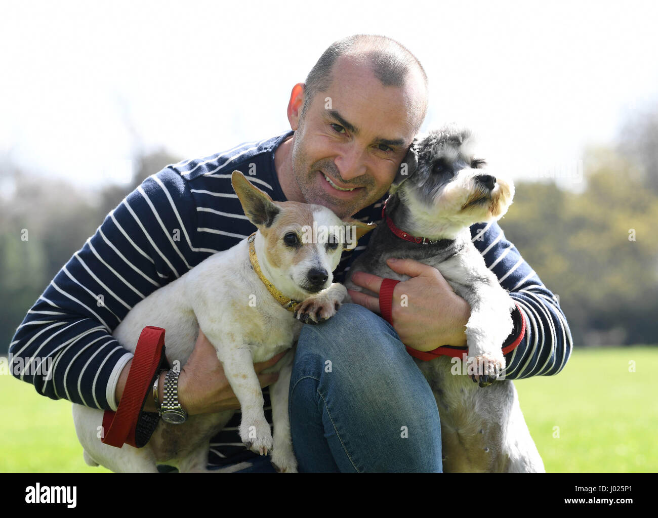 EDITORIAL USE ONLY Louie Spence with his dogs Lola, a miniature ...