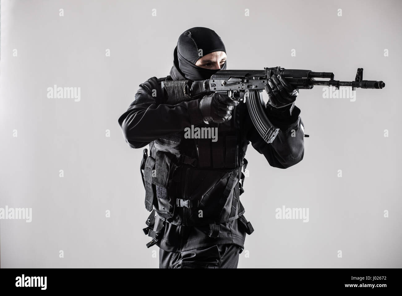 Modern soldier with rifle isolated on a white background Stock Photo ...