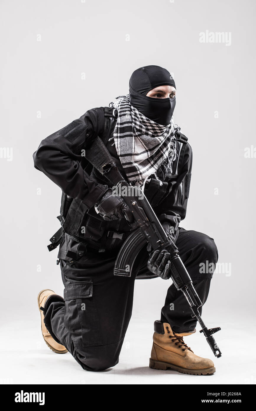 Man holding ak47 gun hi-res stock photography and images - Alamy