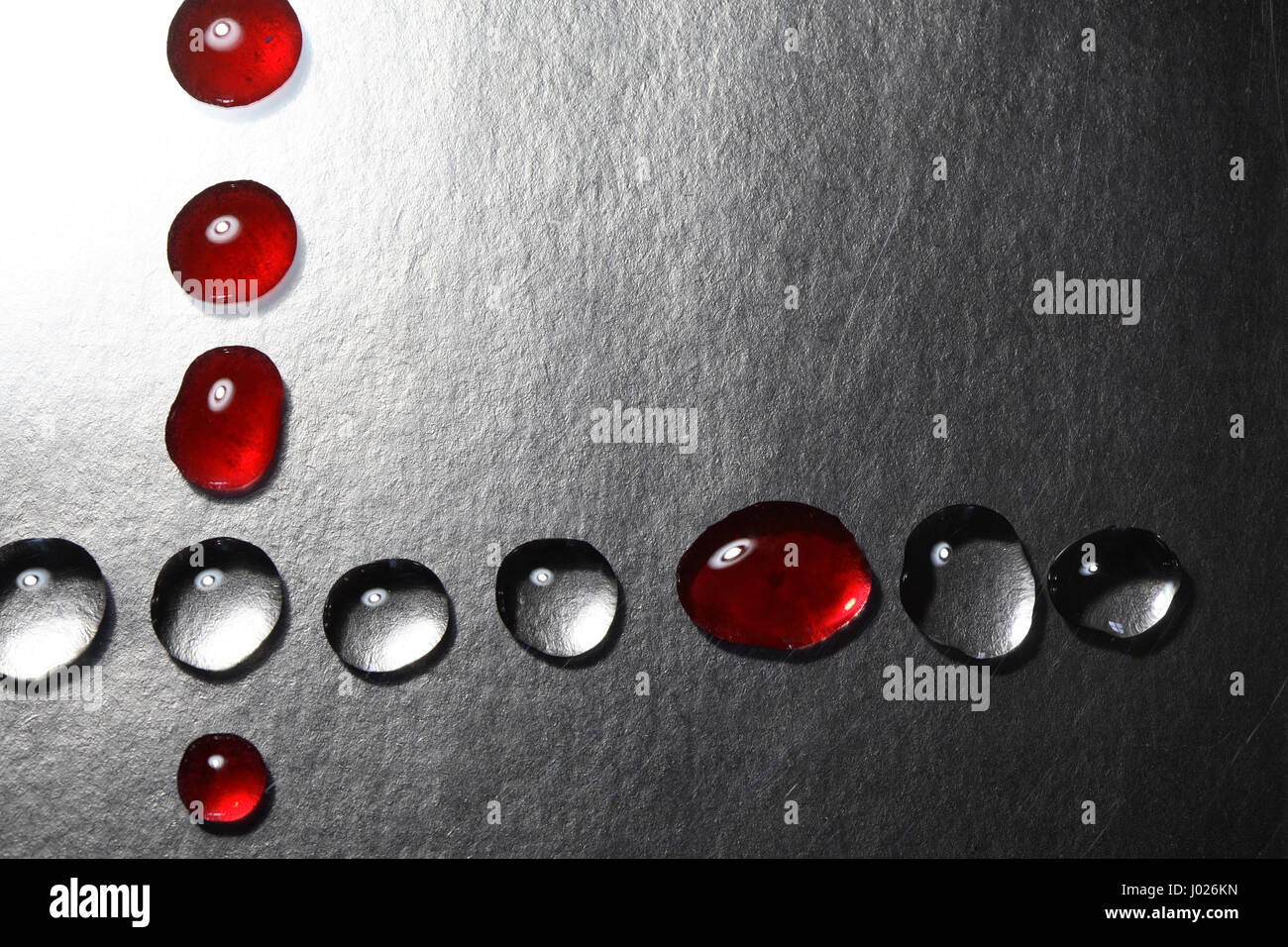 Red and transparent drops as border on dark background Stock Photo - Alamy