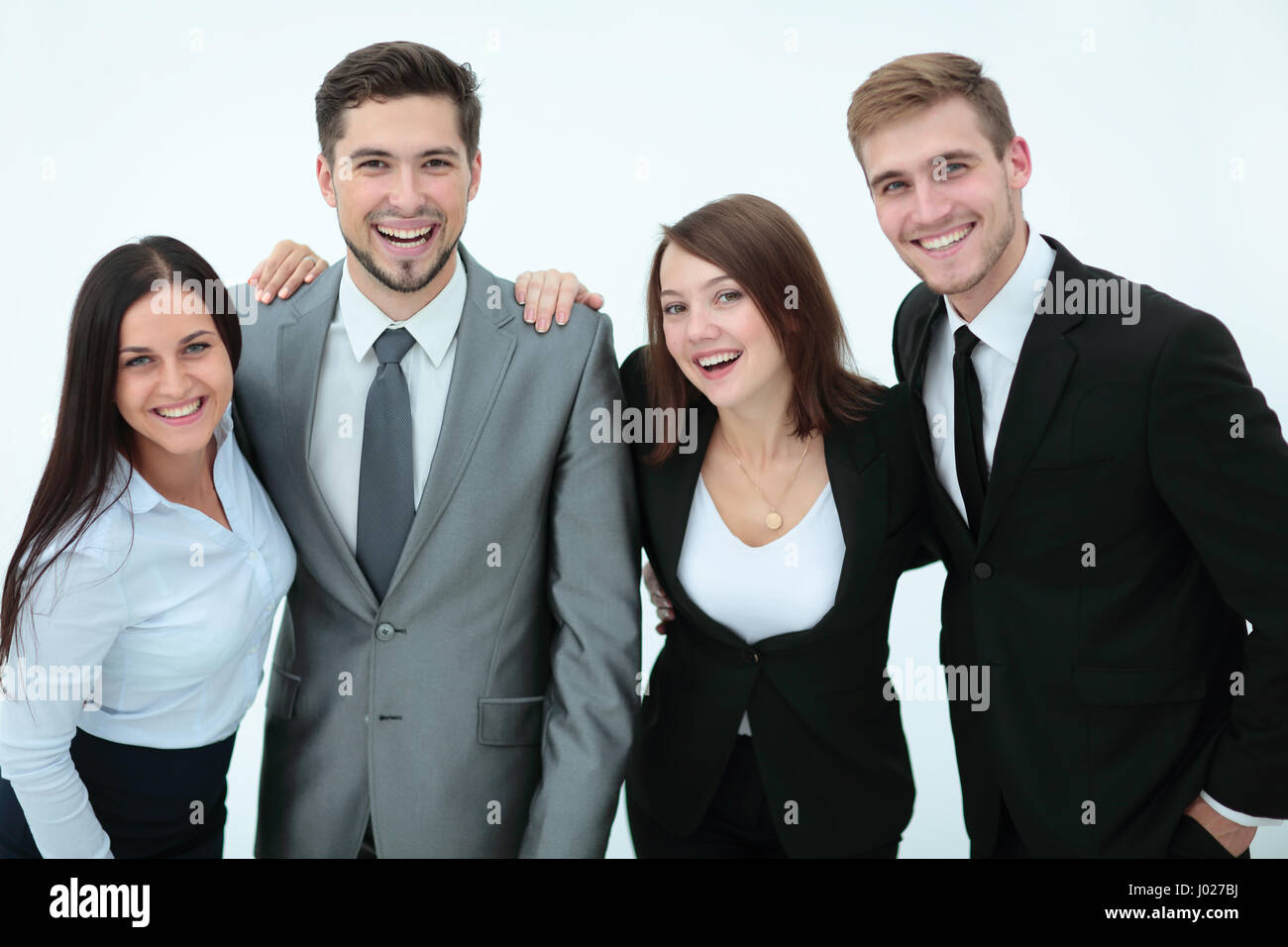 Photo of friendly young businesspeople posing together Stock Photo - Alamy
