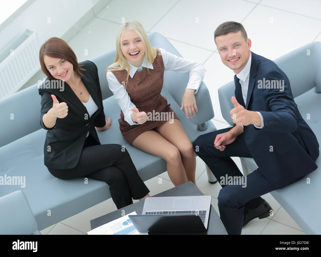 Business people at work. Happy business people in formalwear sho Stock Photo