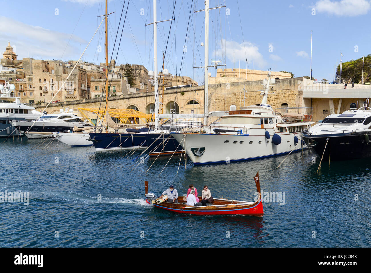 A dgħajsa, a traditional water taxi from Malta. Dockyard ...