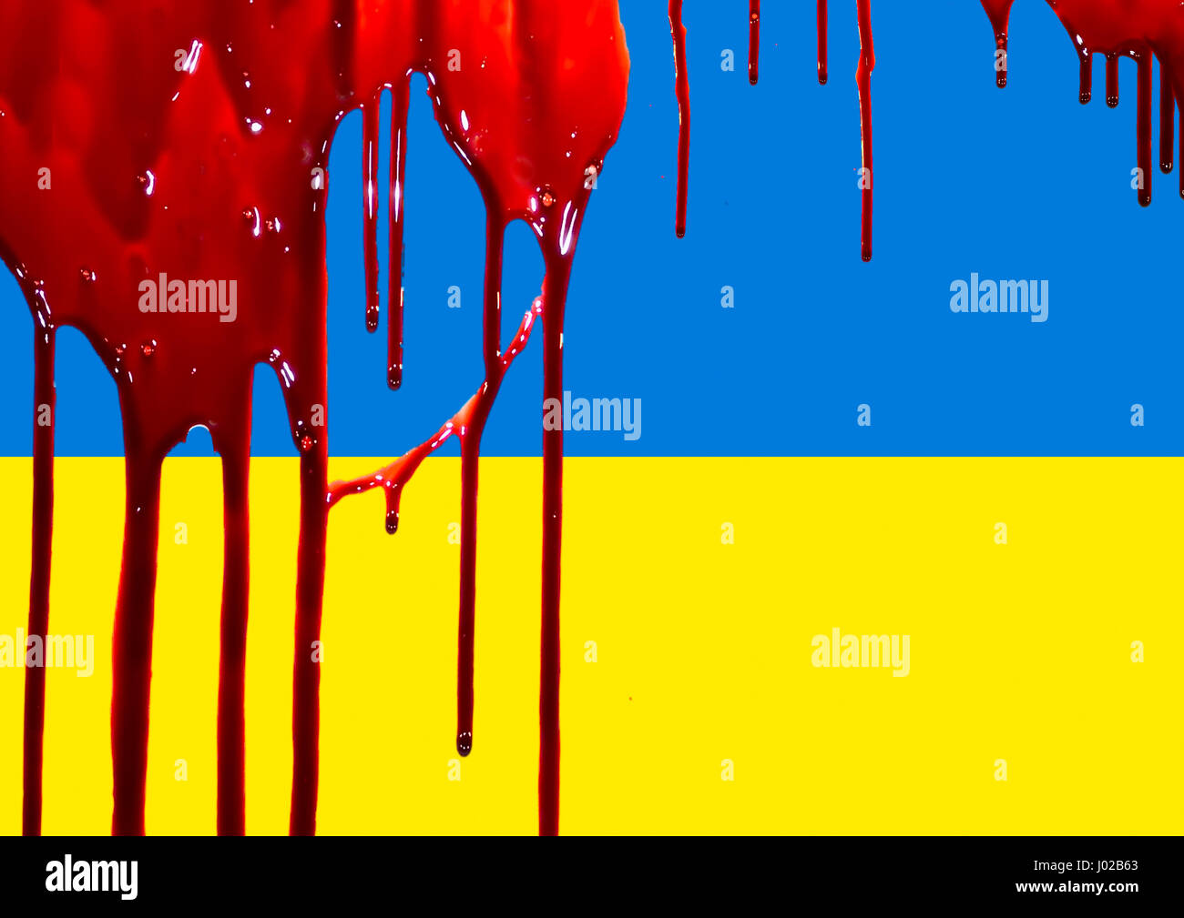 Ukrainian flag in the blood. Revolution in Ukraine Stock Photo