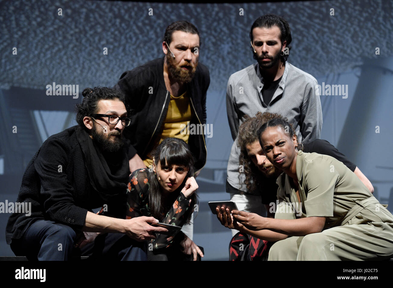 Members of the Exil Ensemble perform on stage during the photo