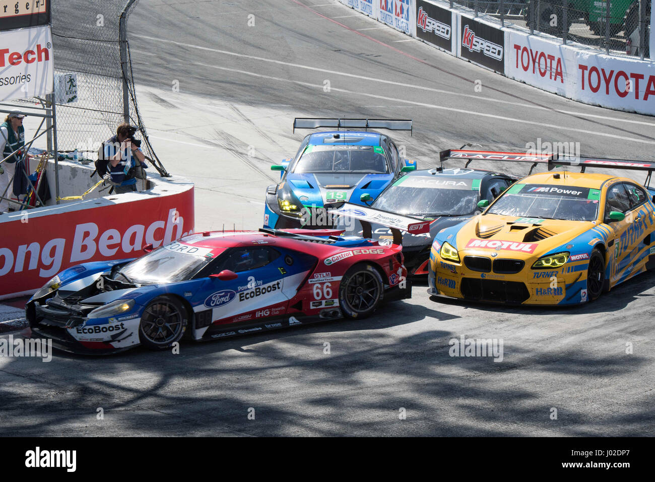 Long Beach, California, USA. 8th April, 2017. Track By Drivers For The Incident. 08th Apr, 2017. A multi-car incident in the hairpin turn on the final lap of the IMSA BUBBA Burger Sports Car Grand Prix at Long Beach had the entire racetrack blocked as race-leading Antonio Garcia in the No. 3 Corvette C7.R ahead of Tommy Milner and Richard Westbrook. Garcia attempted to pass outside but was blocked eventually finishing 5th with Milner taking the victory. 3GT Daytona driver Robert Alon was confronted on track by drivers for the incident. Long Beach California. Steven Erler/CSM/Alamy Live News Stock Photo