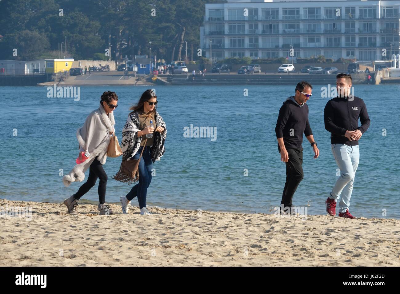 Studland, Dorset, UK. 9th Apr, 2017. Day trippers make their way to the Studland Peninsular as the temperature begins to climb on the Dorset Coast. Credit: Tom Corban/Alamy Live News Stock Photo