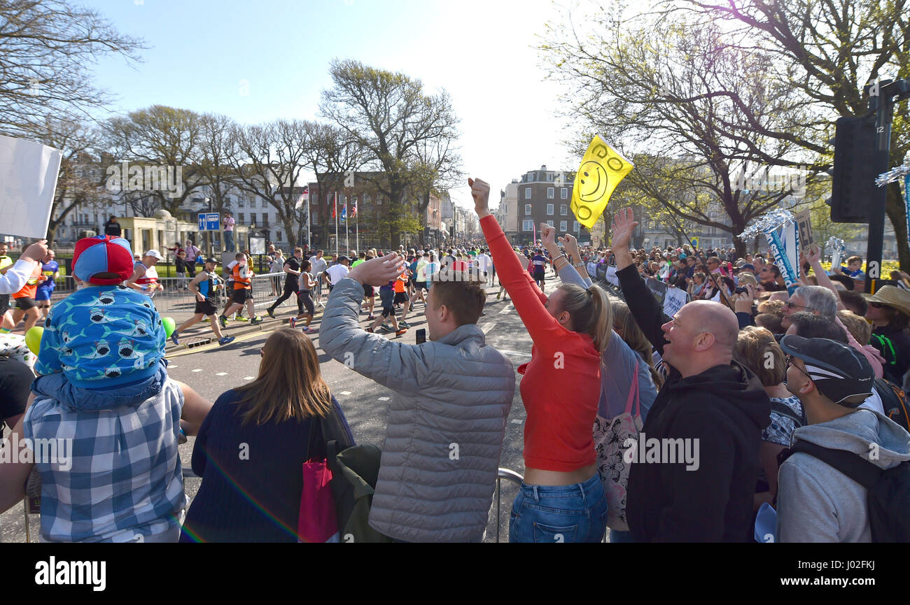 Brighton, UK. 9th Apr, 2017. Spectators cheer on the thousands of