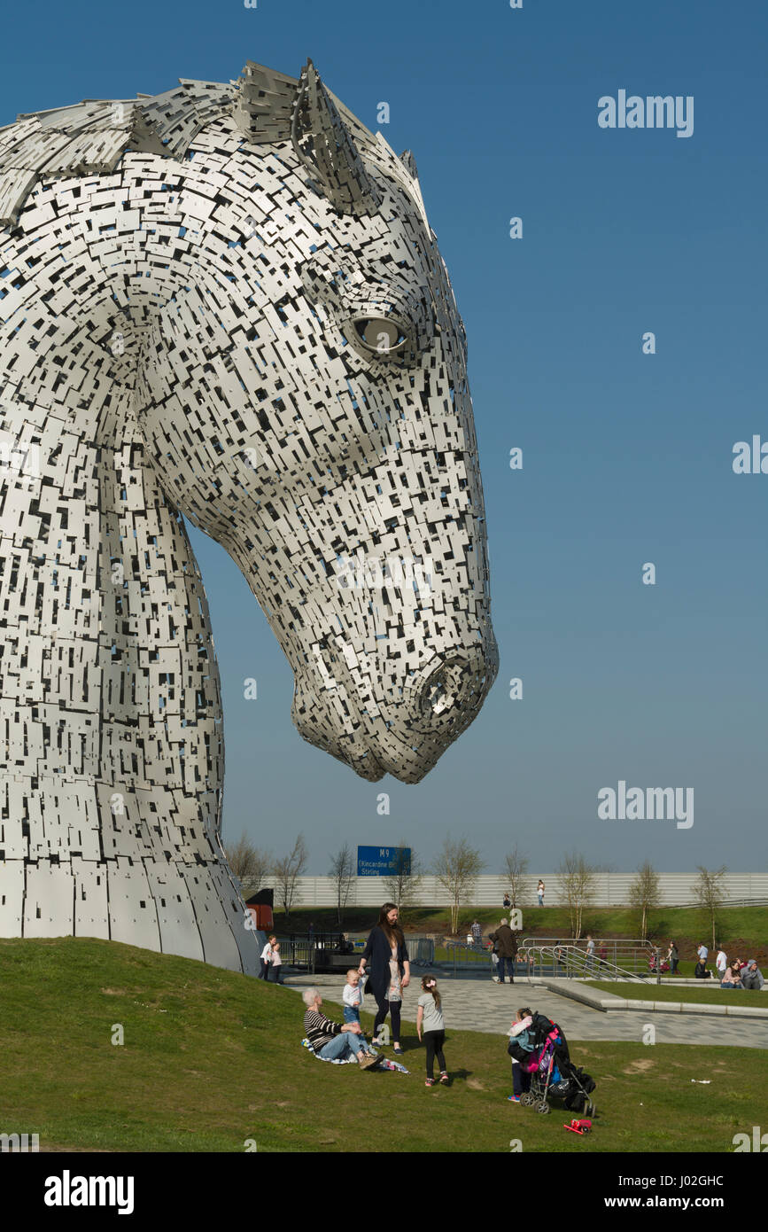 Falkirk, Scotland, United Kingdom. 8th April, Families enjoy spring sunshine at the Kelpies visitor attraction as the weekend heatwave hits Scotland. Credit: Alan Paterson/Alamy Live News Stock Photo