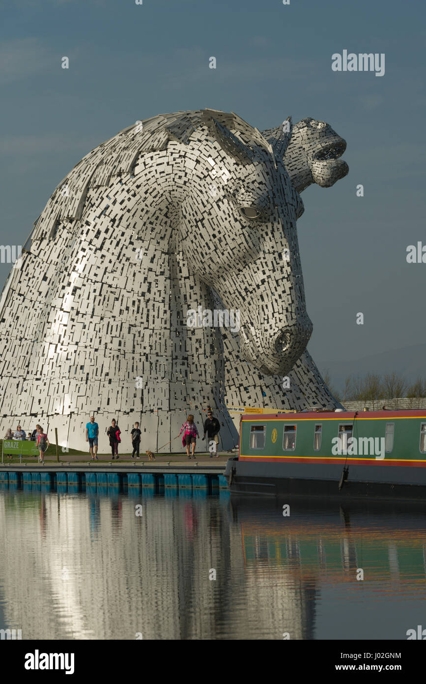 Falkirk, Scotland, United Kingdom. 8th April, Families enjoy spring sunshine at the Kelpies visitor attraction as the weekend heatwave hits Scotland. Credit: Alan Paterson/Alamy Live News Stock Photo