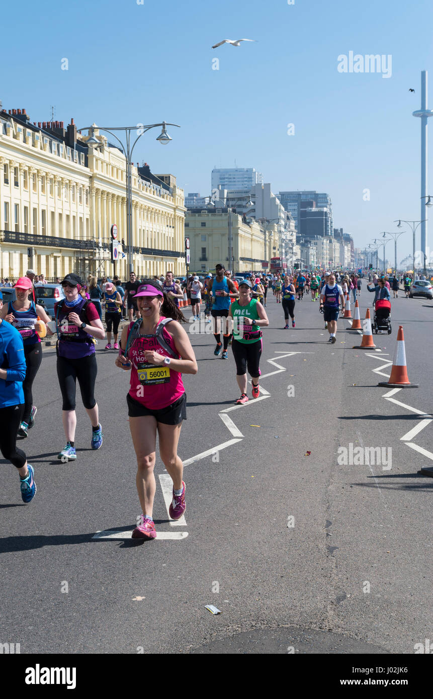 Brighton, UK. 9th Apr, 2017. Runners still managing a smile despite being over half way through. Thousands of people braved the heat on the hottest day of the year so far to participate in the Brighton Marathon. Credit: Elizabeth Wake/Alamy Live News Stock Photo