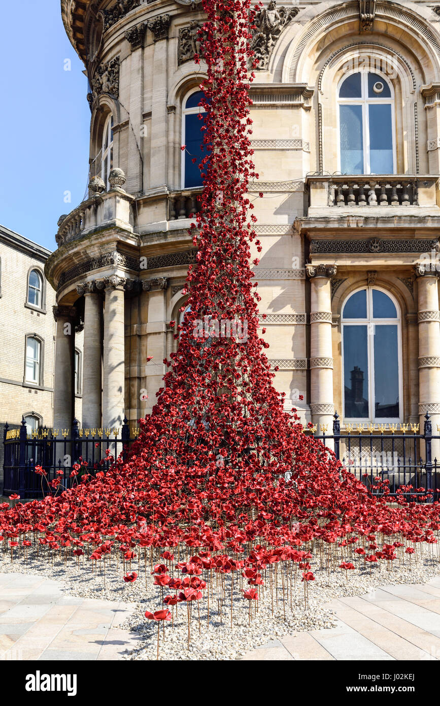 The weeping window display of ceramic red poppies from the Maritime museum on Victoria square, Stock Photo