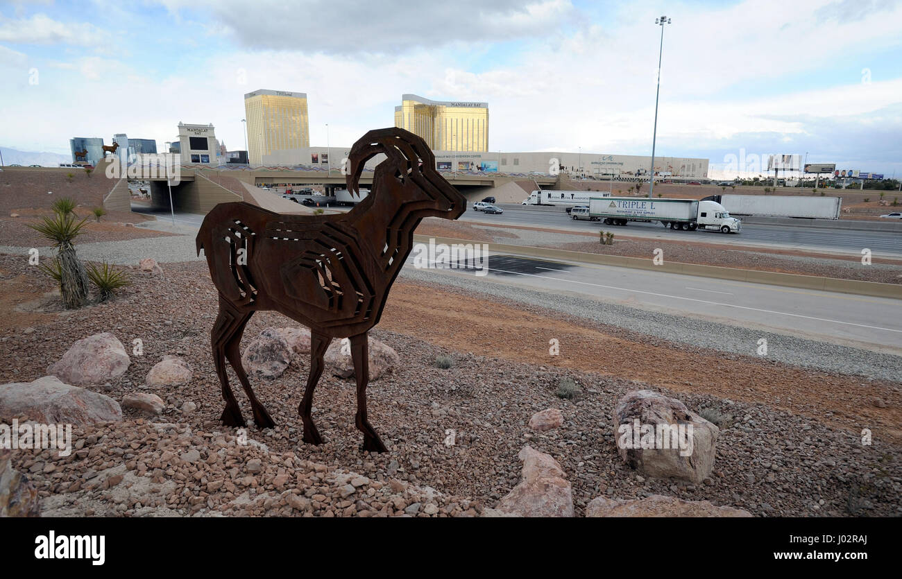 Las Vegas, Nevada, USA. 15th Feb, 2012. A steel sculpture, designed as a big horn sheep appears to watch over the Interstate 15 freeway just south of the Russell Road overpass February 15, 2012, in Las Vegas, Nevada. Forty oversized looking animals were erected along the freeway as part of landscape and aesthetic improvements by the Nevada Department of Transportation. Credit: David Becker/ZUMA Wire/Alamy Live News Stock Photo