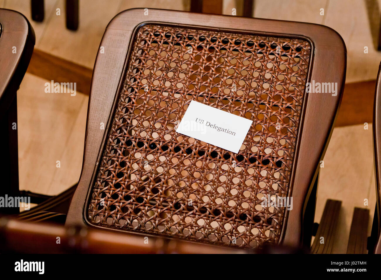Empty US Delegation seat at multinational government meeting - USA Stock Photo