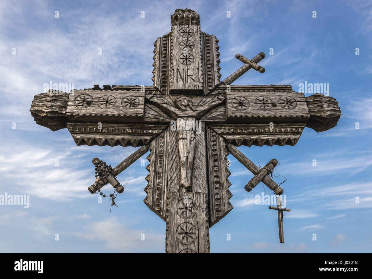 Wooden cross on Hill of Crosses in Lithuania Stock Photo