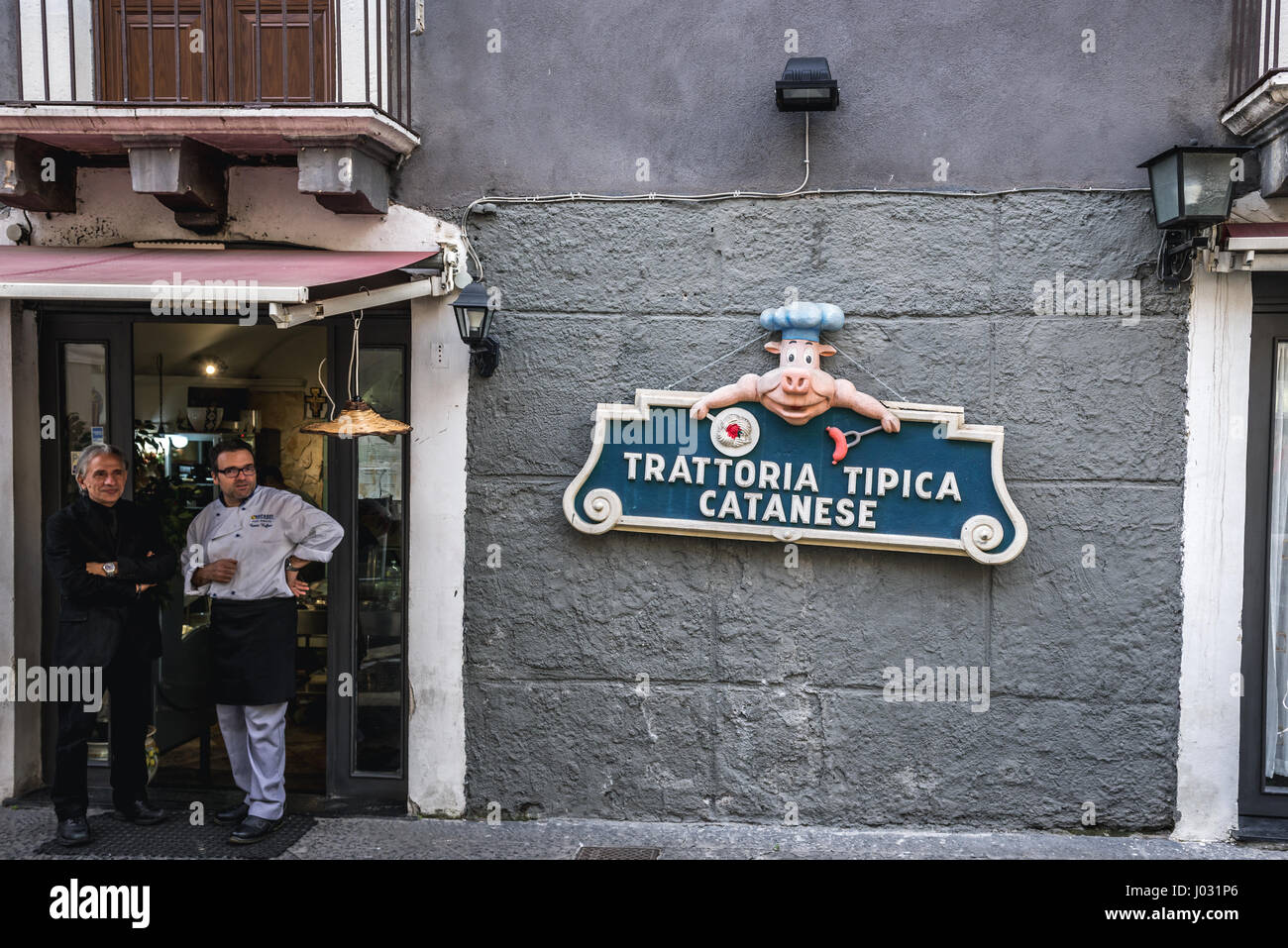 'Typical Catanese Trattoria' sign on the wall of Dalla Padella Alla Brace restaurant on Via Michele Rapisardi street in Catania, Sicily Island, Italy Stock Photo
