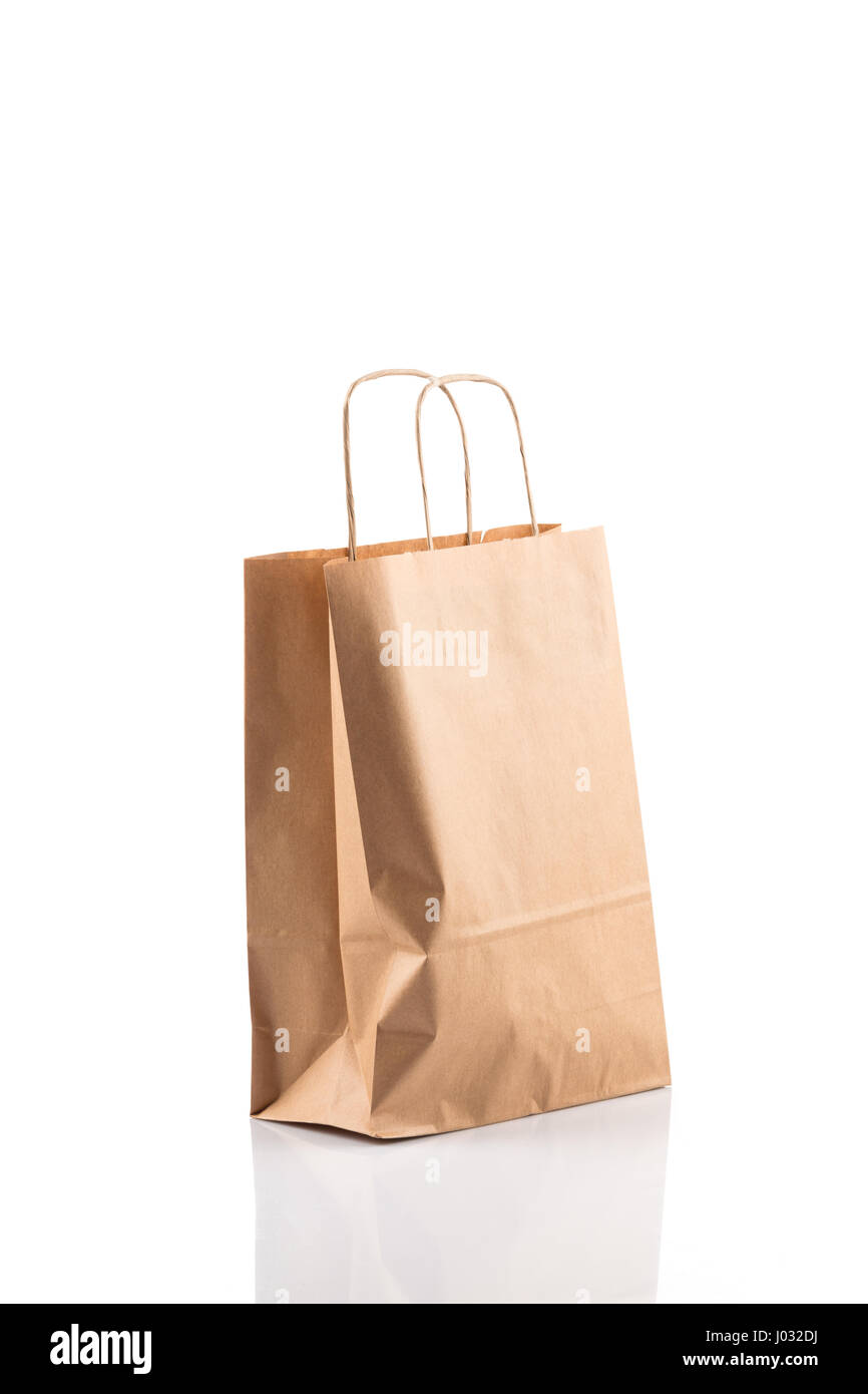 Recycled paper kraft shopping bag isolated on white background Stock