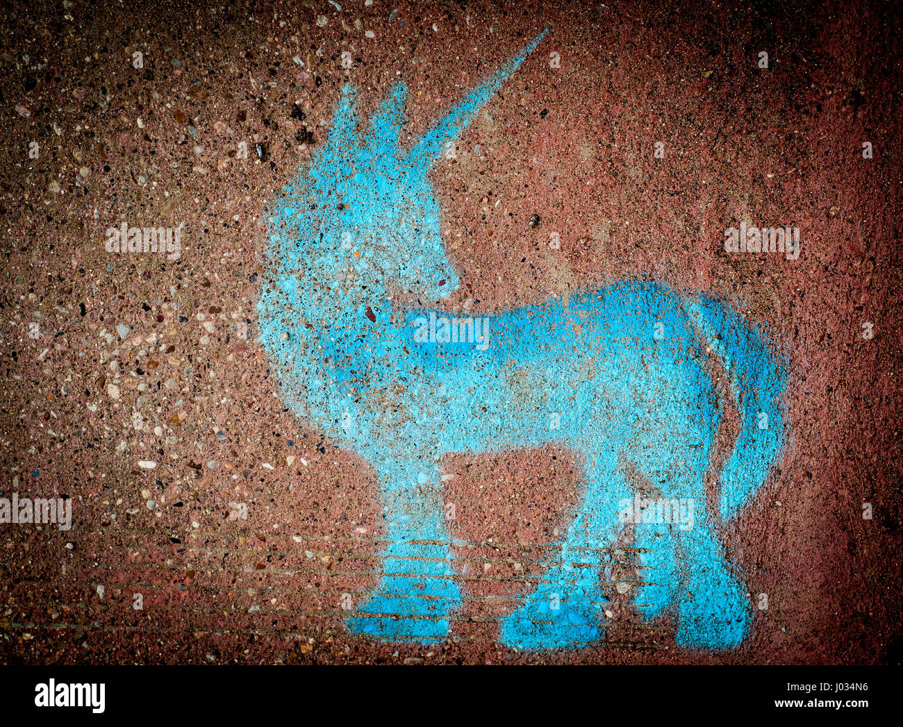 Street graffiti of blue Unicorn in Austin, Texas Stock Photo