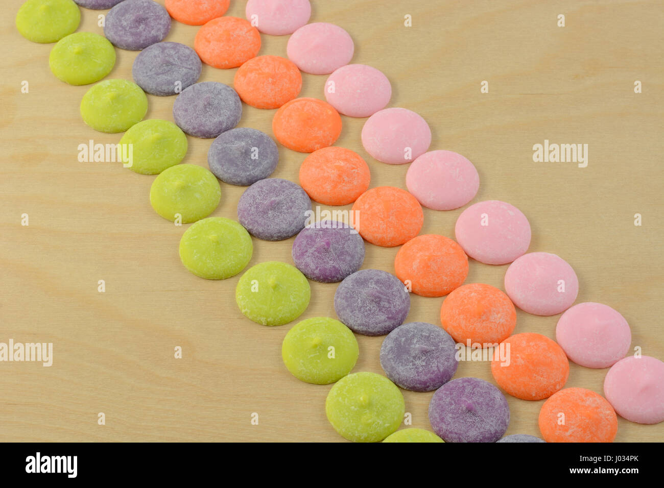 Multicolor white chocolate candy discs meltable for decorating food and