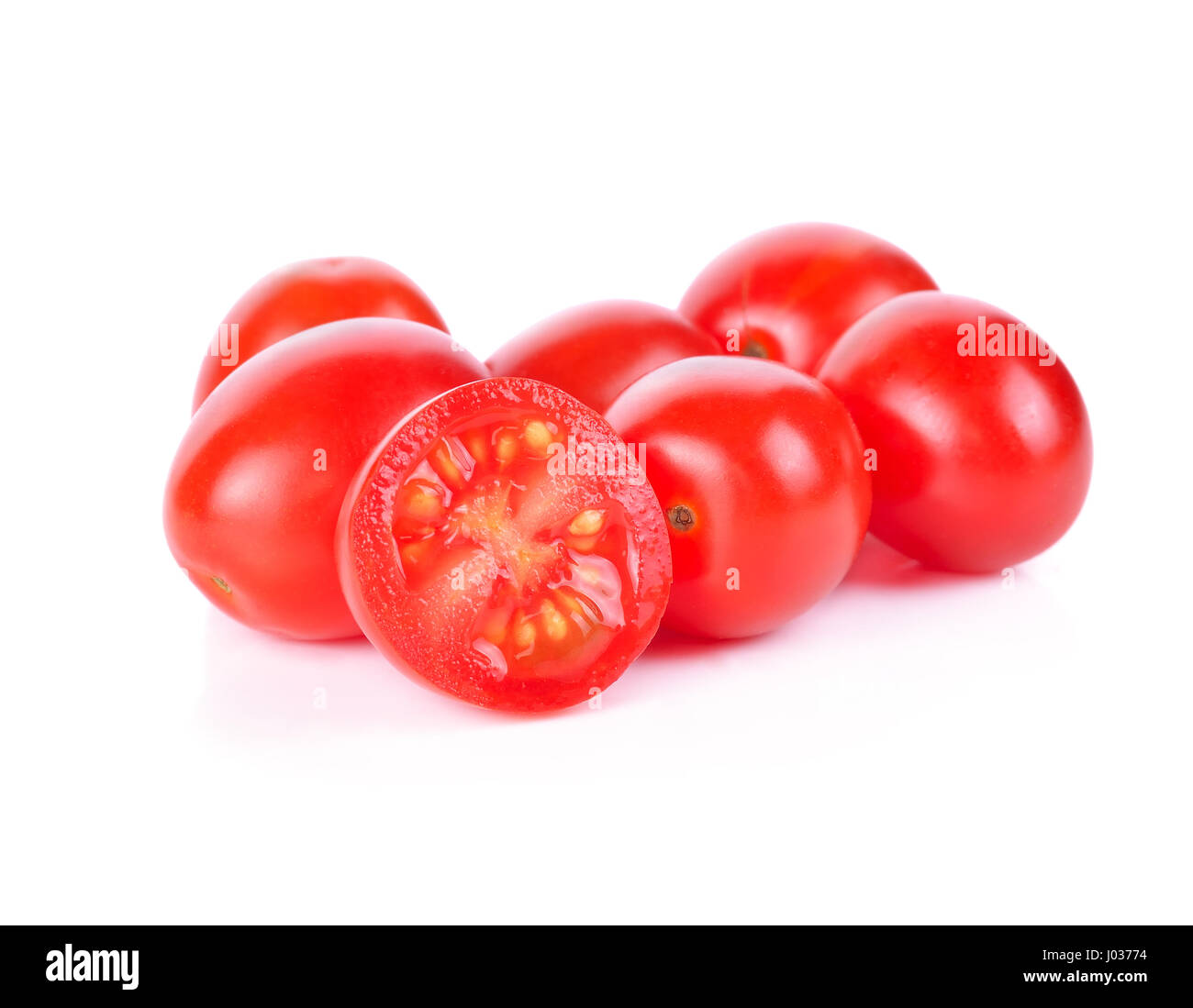 The cherry tomatoes on a white background Stock Photo - Alamy