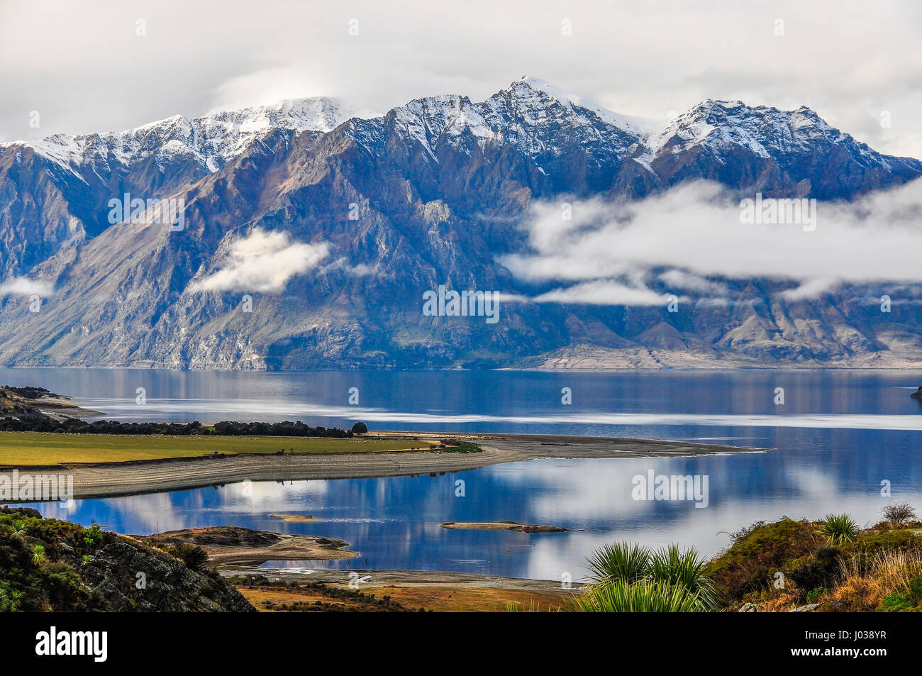 Clouds lying low over a lake near Wanaka in the Southern Lakes Region