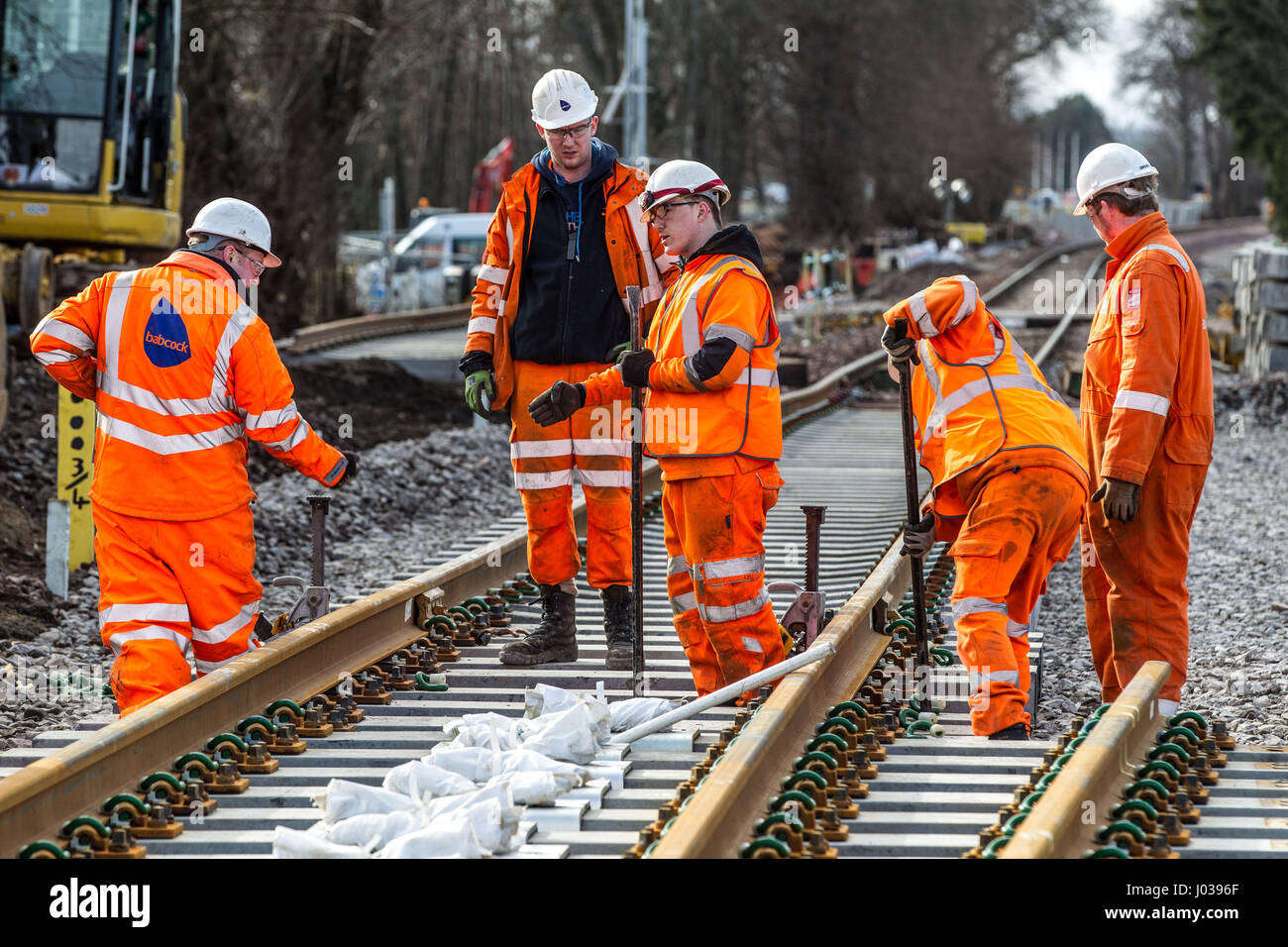 Rail construction workers installing new tracks and points Stock Photo Alamy