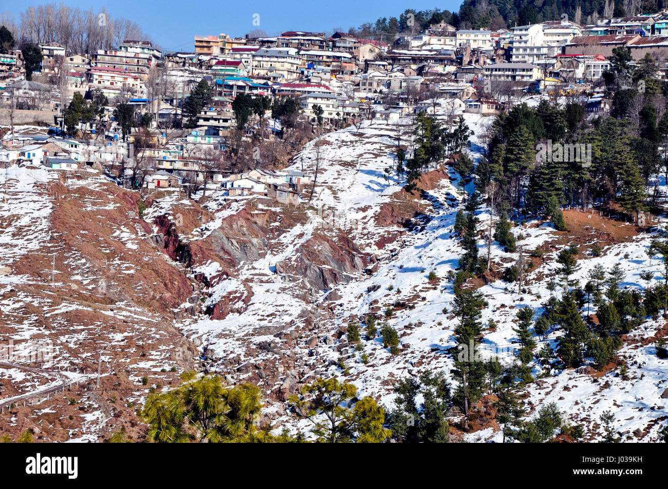 Snow-capped village houses in the valley Stock Photo - Alamy