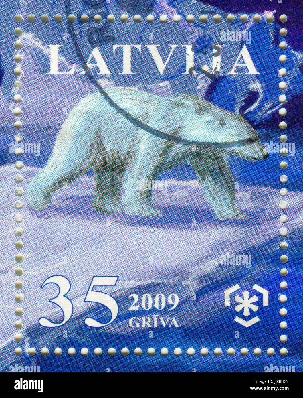 GOMEL, BELARUS, APRIL 8, 2017. Stamp printed in Latvia shows image of  The polar bear (Ursus maritimus) is a carnivorous bear whose native range lies  Stock Photo