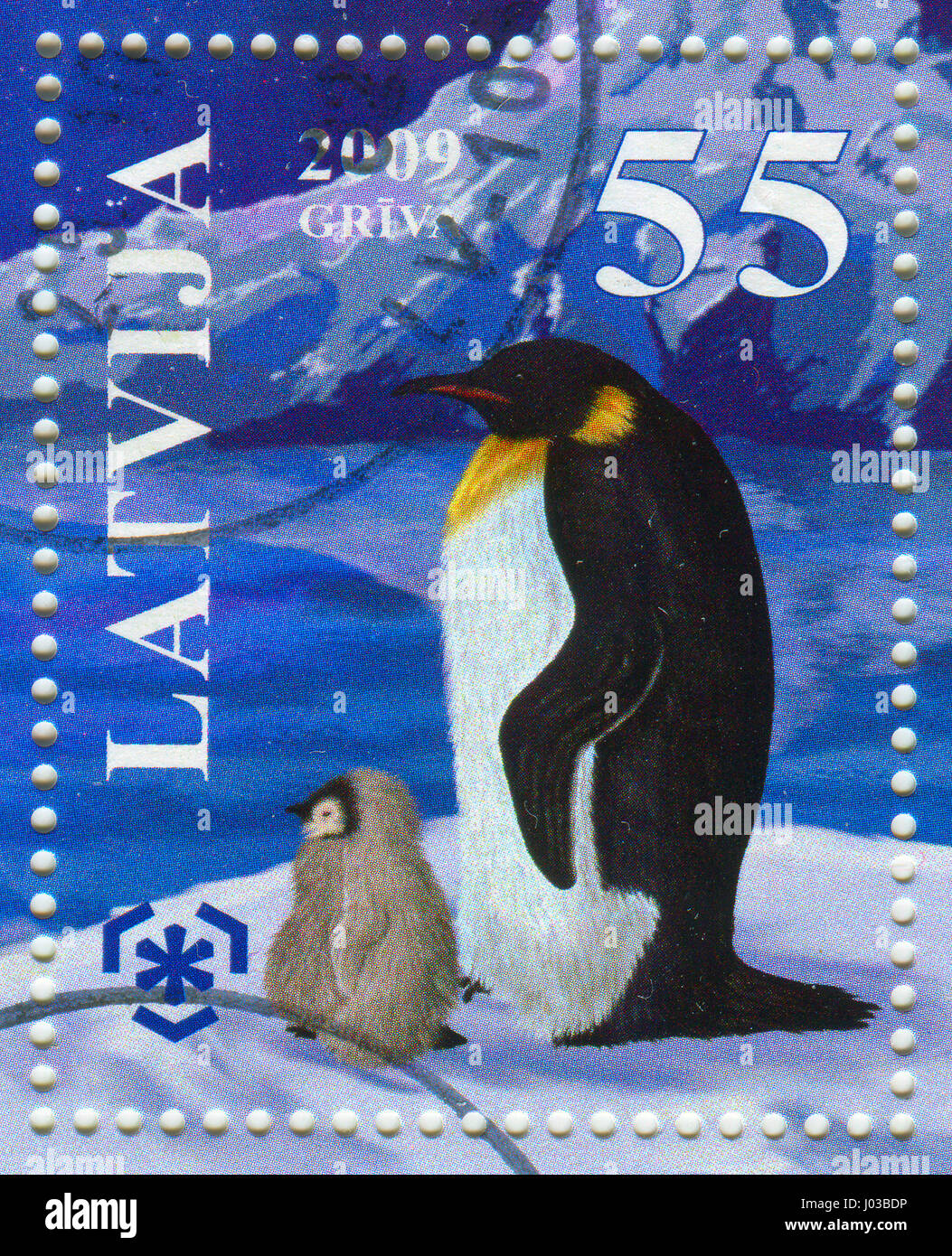 GOMEL, BELARUS, APRIL 8, 2017. Stamp printed in Latvia shows image of  The Penguins (order Sphenisciformes, family Spheniscidae) are a group of aquati Stock Photo