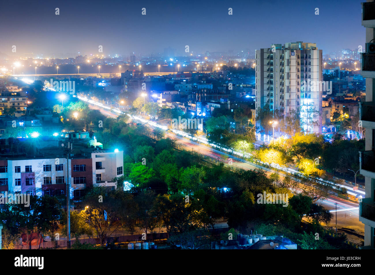 Noida cityscape at night showing lights, buildings and residences ...