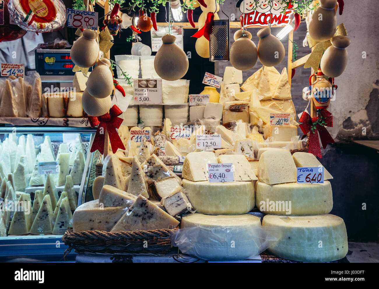 Varieties of cheese for sale on famous old fish market called La Pescheria in Catania city, east of Sicily Island, Italy Stock Photo