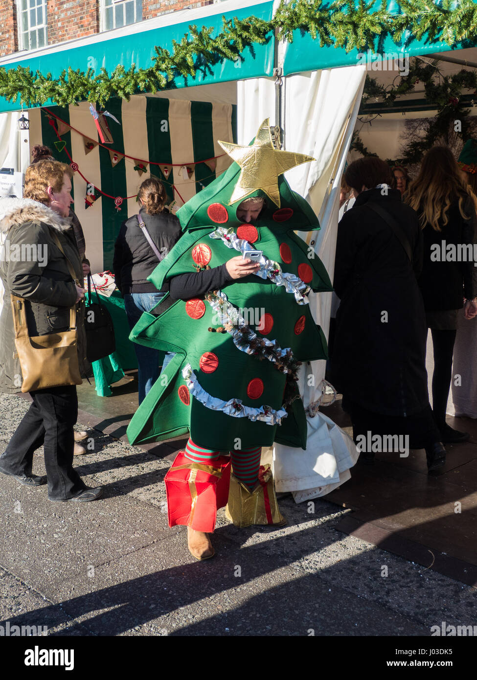guy dressed as christmas tree New York City's Mister Christmas Tree makes his yearly appearance across the city