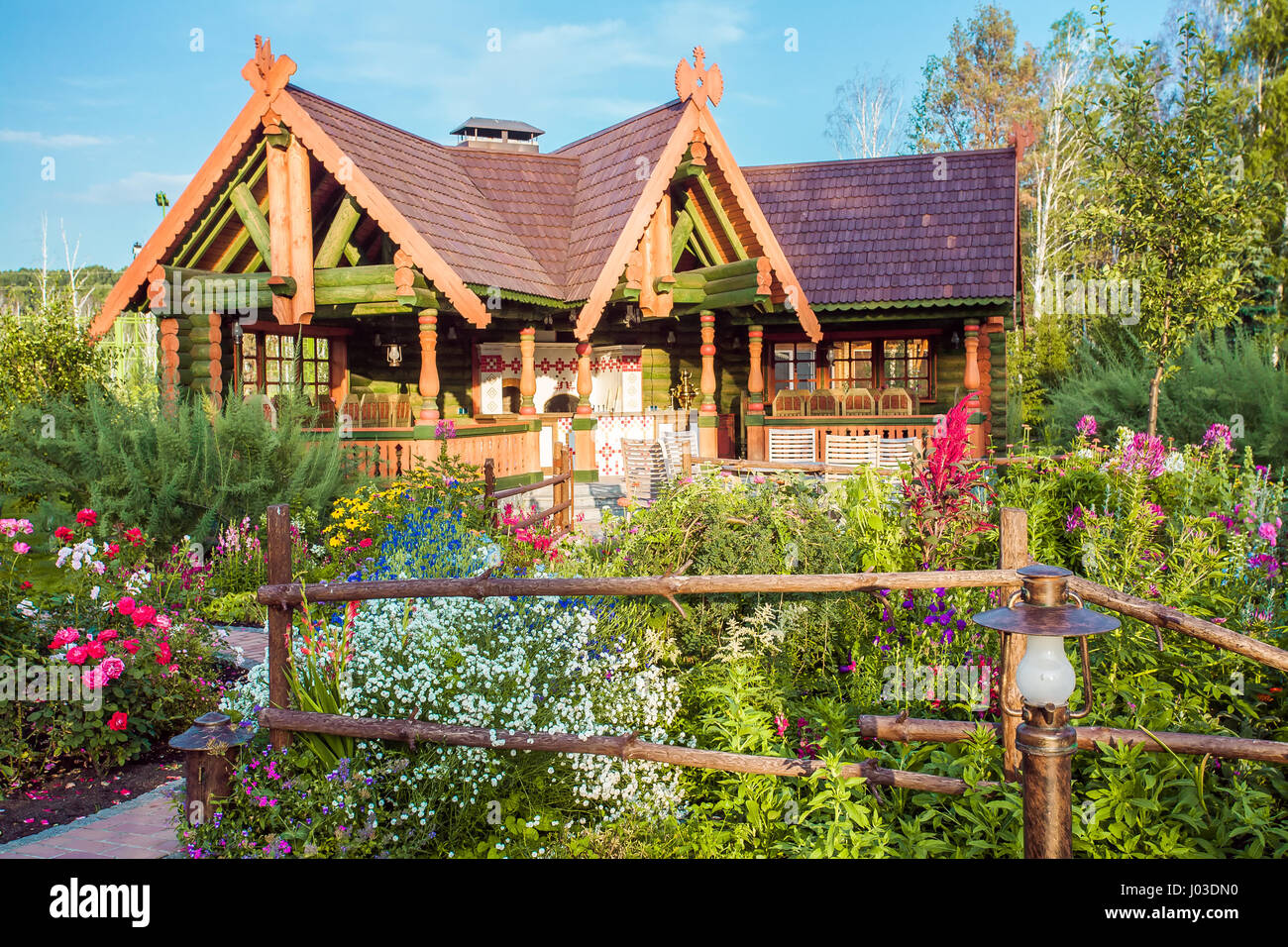 summer garden and wooden house Stock Photo - Alamy