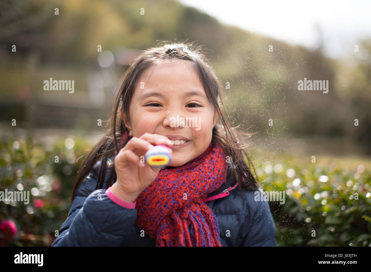 Playing soap bubble in the park Stock Photo - Alamy