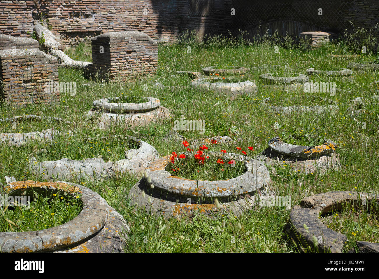 Rome. Italy. Ostia Antica. Caseggiato dei Doli, terracotta jars once held wine & oil. Stock Photo