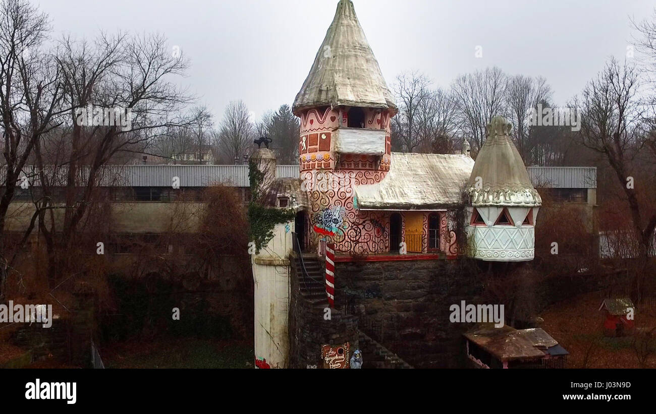 HAMBURG, USA: EERIE images and video footage have revealed the abandoned remains of a creepy ‘gingerbread’ castle that wouldn’t look out of place in a fairytale by the Brothers Grimm. The stunning drone footage shows the exterior of the colourfully painted tower while inside multi-coloured steps lead up to the top past painted figures of storybook characters. Other old amusement park buildings lie in ruins beside the Gingerbread Castle while a sad Humpty Dumpty figure sits watching from a nearby wall. The spooky video and pictures were taken at the Gingerbread Castle in Hamburg, New Jersey by  Stock Photo