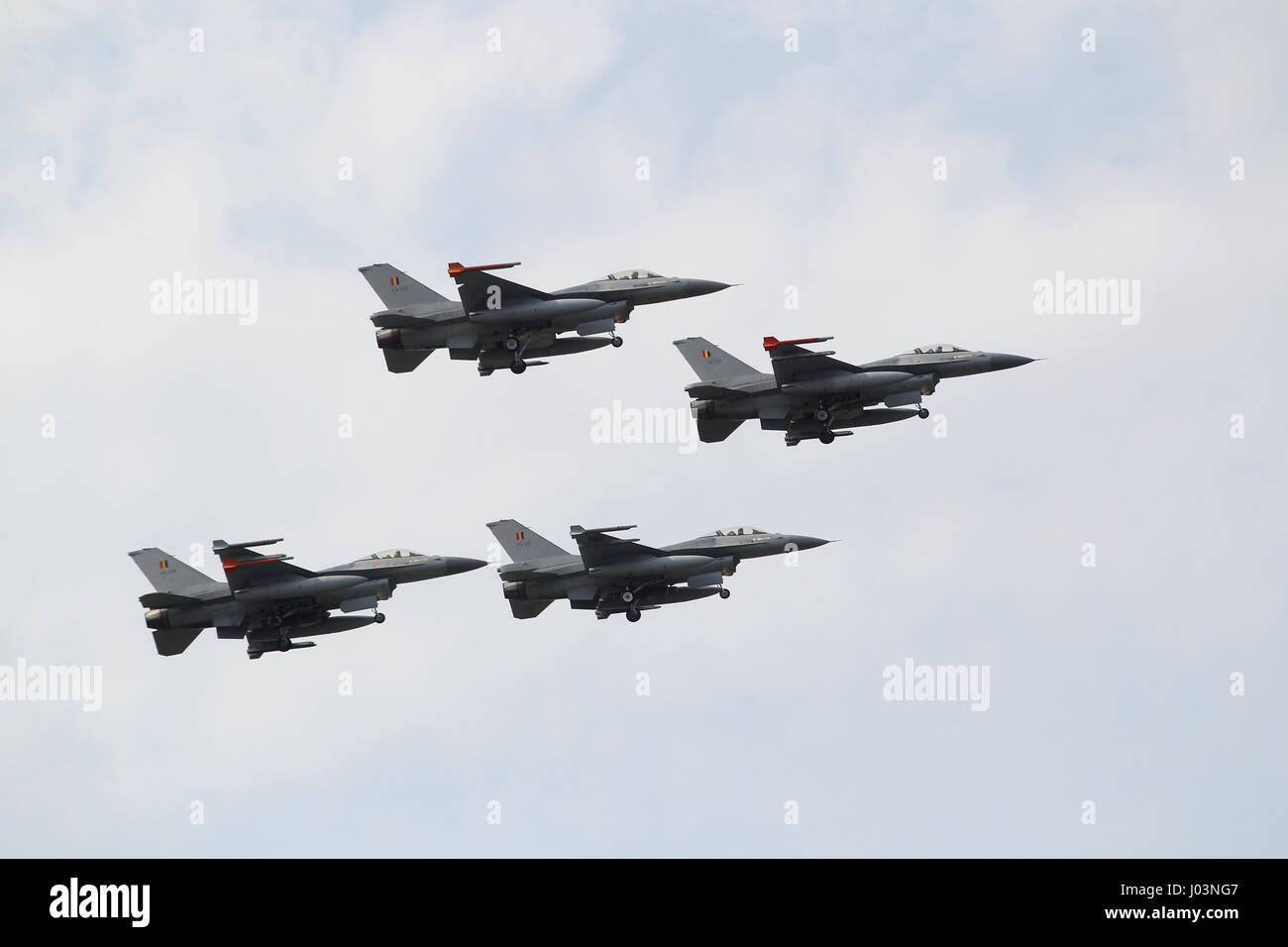 Four F-16 fighter jets of the Belgian Air Component in a flyover. Stock Photo
